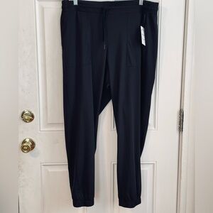 Jockey Women's Black Track Pants. Very stretchy. Elastic ankle. Size L. NWT